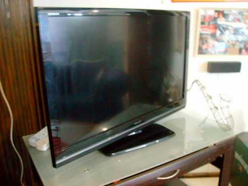 Big screen Toshiba tv with LG blu ray surround sound system