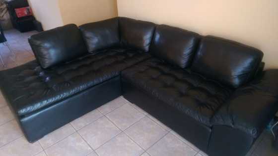 Black L shape leather couch