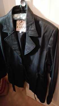 Black leather three quarter length belted jacket