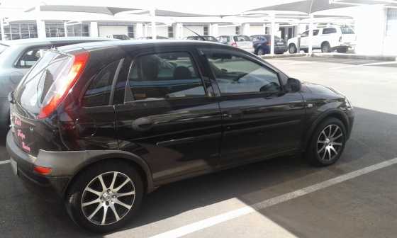 Black Opel Corsa 1.4