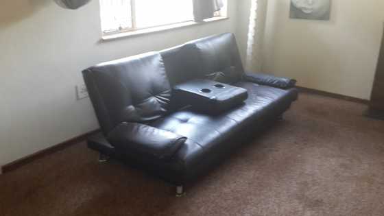 Black PU Leather Sleeper Couch for a bargain