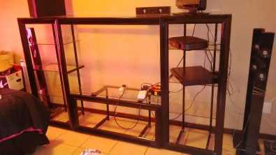 Black wall unit with glass for sale