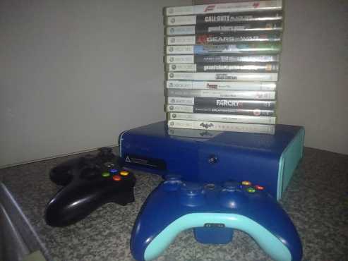 Blue xbox 360 limited edition with 18 games