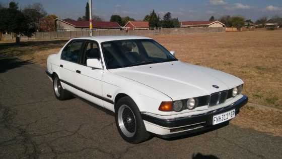 BMW 735i, full house, leather electric seat, sunroof, heated seats, ac, em, speed cruise ect, flag