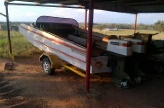 Boat with 2 Johnson Motors and Trailer