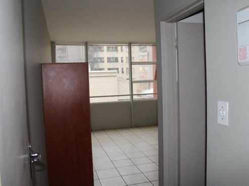 Braamfontein open plan bachelor flat with separate bathroom and kitchen Rental R3171 Call 063-237734