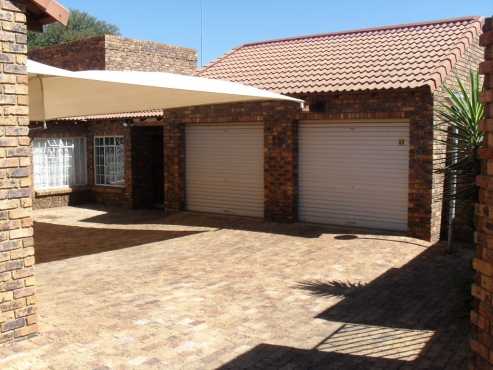 Brackendowns, Alberton. Beautiful 3 bedroom townhouse with large private garden, garages, carports.