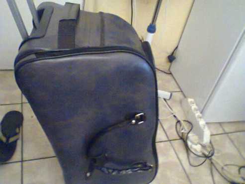 Brand new  Big Travelling Bag for Auction sale. Never been used. Neat and clean. Call for it now.