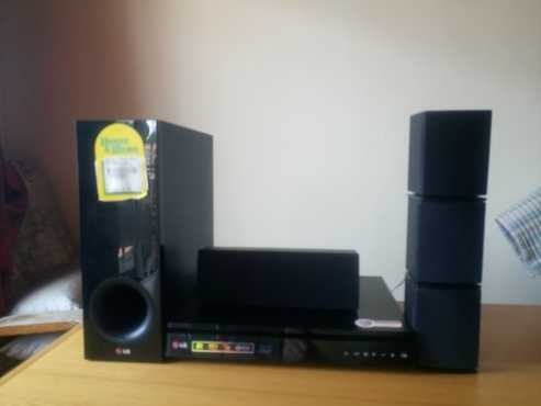 BRAND NEW (black) LG HOME THEATER SYSTEM WITH REMOTE