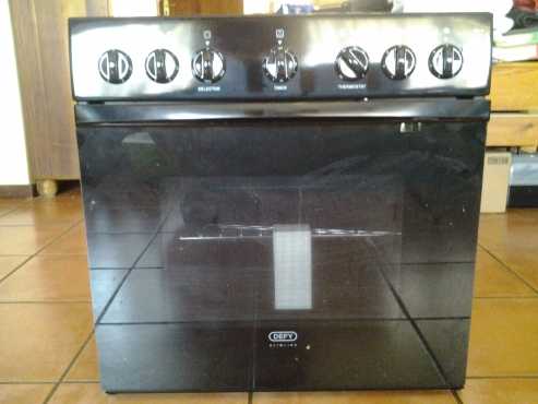 Brand new Defy under counter slimline oven