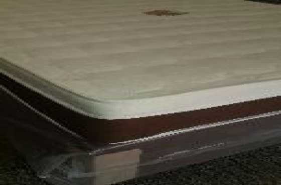 Brand new Orthopaedic Pampertop Queensize bed.