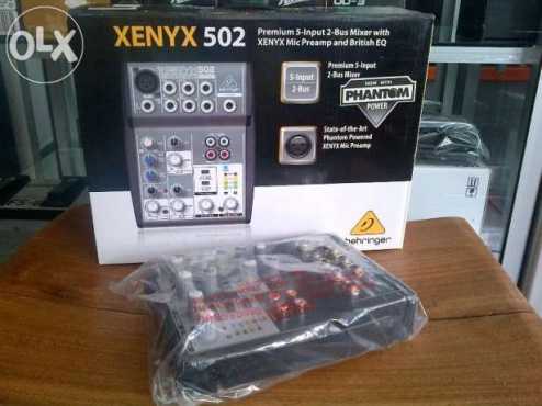 Brand New XENYX 502 Behringer Mixer with all cables for sale... Never been used, Brand New