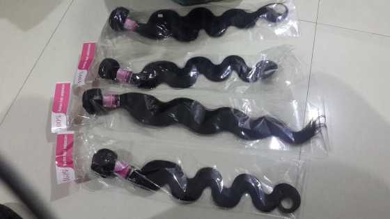 brazilian hair 22 inches R850 per bundle