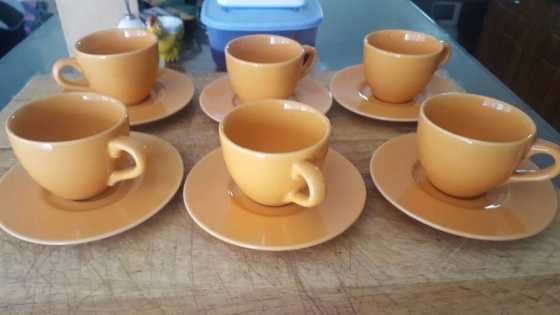 BROWN CUPS AND SAUCERS