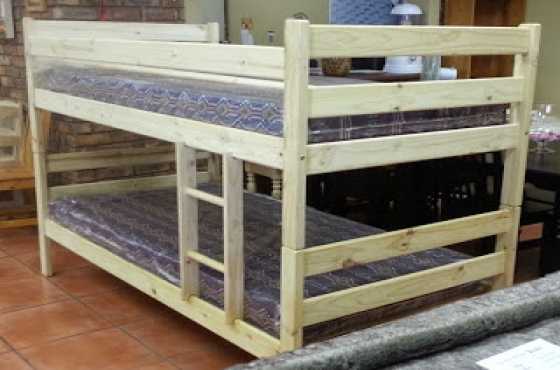 bunk bed in raw pine wood