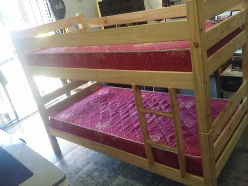 Bunk beds pine including 2 new mattresses in pristine condition