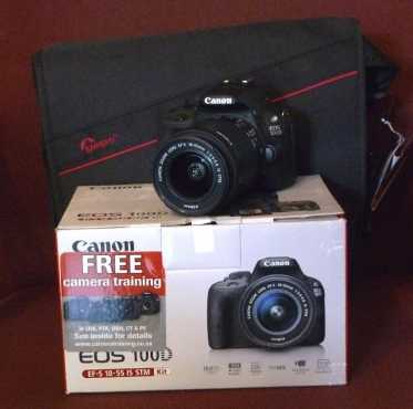 Canon 100D SLR camera  18-55 IS STM lens bundle.New with warranty