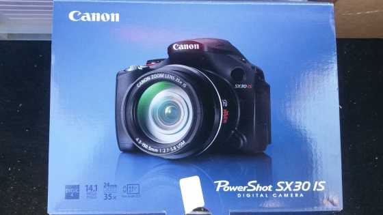Canon SX 30 IS digital camera with memory card