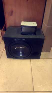 Car radio and pioneer sub woofer