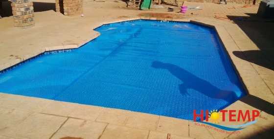 Centurion Solar Pool Heating Panels and Pool Blanket Installed