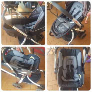 Chelino Twister with car seat base for sale