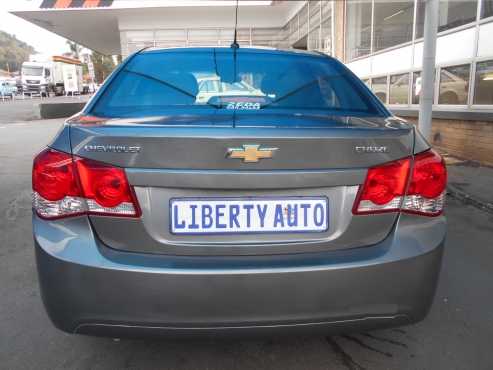 Chevrolet Cruze 2011 Sedan 1.6 LT  98,690 km Manual Gear  Fabric Seats, Electric windows,  Traction