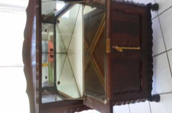 Corner ball and claw liquor cabinet