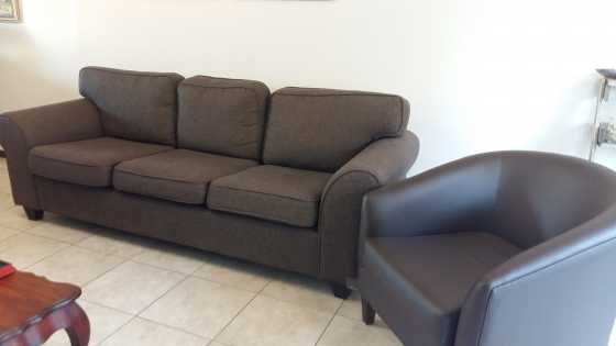 Couch with tub chairs