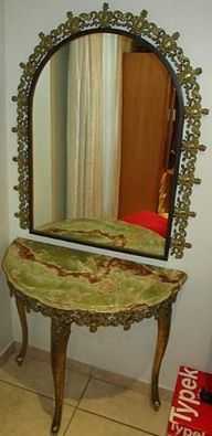 Crescent marble table with deco brass 3 legs including deco brass mirror.