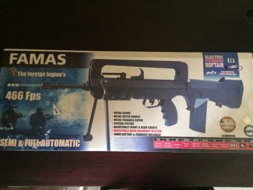 Cybergun Famas F1 AEG Airsoft rifle, with smart-charger