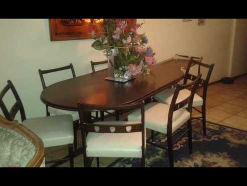 Dark wood and white leather Dining Room Table and Chairs