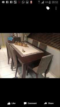 Dark wood dining table and chairs