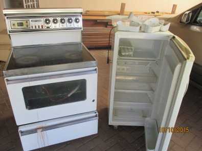 Defy glass top stove and LG expresscool fridge