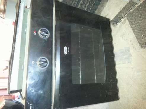 Defy slimline 600 mm under the counter oven and solid hob for sale. Appliance in good condition.