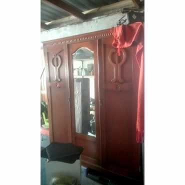 Detailed wooden wardrobe in immaculate condition