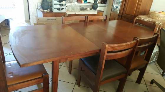 Dining room table with 6 chairs and sideboard