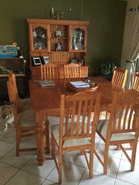 Dining table with chairs and cabinet