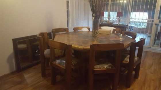 Diningroom table and 8 chairs