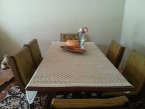 dinning table and chairs with side board