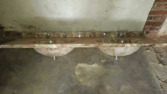 Double basin with taps