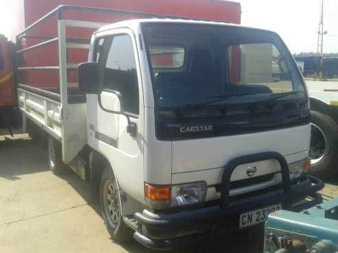 Ex AFROX NISSAN UD20 2009 dropsides truck for sale.