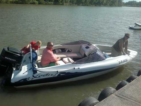 EXODUS 17 FT ,200HP MURCARY V6 ON A TOMCAT TRAILOR