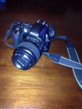 Exquisite Nikon D3100 with the 18-55mm lense and free camera bag