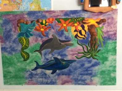 Fabric-painted dolphinsea scene, blockedframed