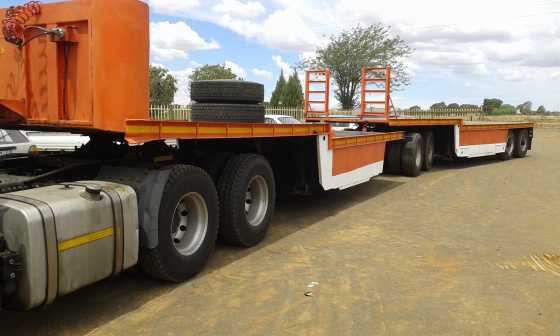 Flat deck interlink trailer