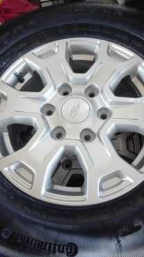 FORD 16 inch Mags and New Continental 25570R16 tyres Set of 4