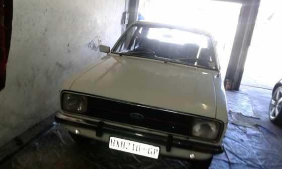 Ford Escort 4 door, still original engine, body everything and very well looked after, nice car for
