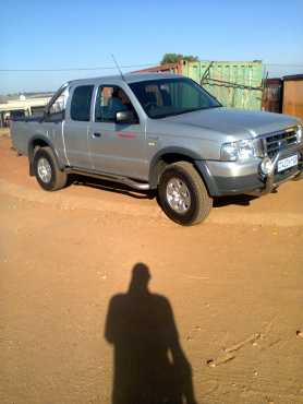 ford ranger turbo diesel supercab silver metallic.