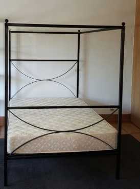 Four poster bed