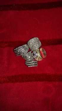 Four silver dress rings for sale